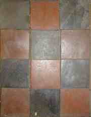 Example of reclaimed floor tiles in terracotta and black